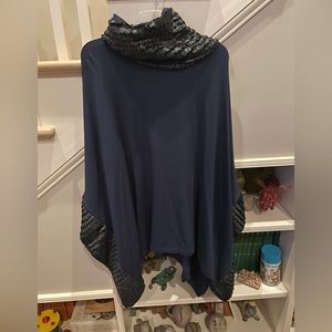 Capote M/L poncho.  Eggplant colored with black faux trim.